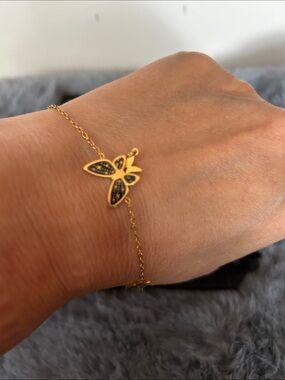 Gold Butterfly Chain Bracelet with Black Accents